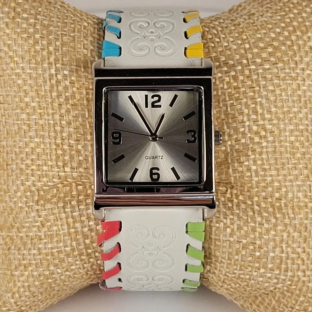 Silver Quartz Watch with Embossed Cuff White Leather Strap and Multicolor Design